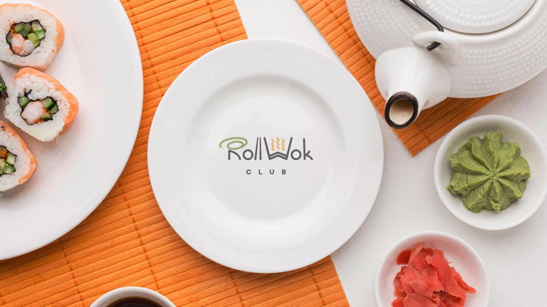 Разработка логотипа и фирменного стиля в Менделеевске для суши-бара «Roll Wok Club» Разработка логотипа и фирменного стиля в Менделеевске для суши-бара «Roll Wok Club»